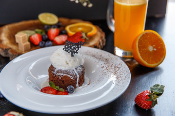 Breakfast with cake and juice.