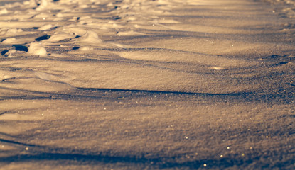 Snow drifts in winter - snow photographed in the winter season, which appeared after a snowfall. close-up,