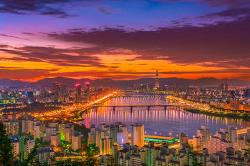 Fototapeta premium Seoul city skyline, Hangang River and Lotte World mall at nigth in South Korea.