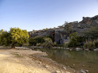 Rocky canyon of a small river in northern Oman