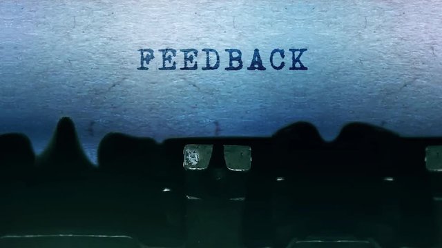 Feedback Word closeup Being Typing and Centered on a Sheet of paper on old vintage Typewriter mechanical 4k Footage Background Animation.
