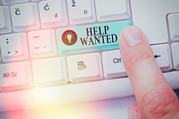 Text sign showing Help Wanted. Business photo showcasing An ad in the paper an employer places to...