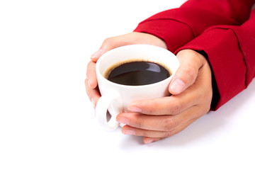 Woman hands hold a white cup of coffee