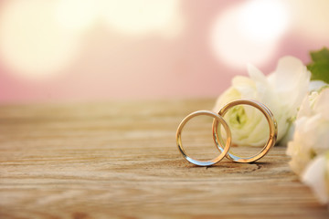 Delicate Wedding background with Rings and Buttercup Flower
