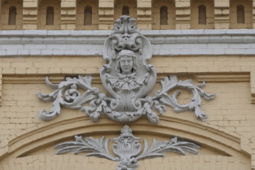 coat of arms. Bas-relief on the facade of an old house
