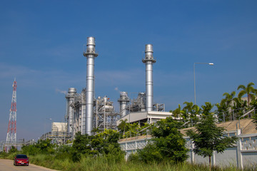 Turbine generator in power plant with blue sky