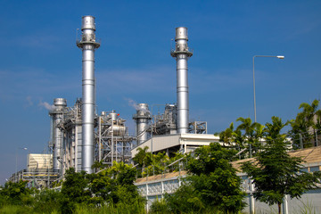 Turbine generator in power plant with blue sky
