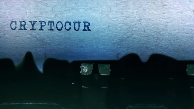 cryptocurrency Word closeup Being Typing and Centered on a Sheet of paper on old vintage Typewriter mechanical 4k Footage Background Animation.