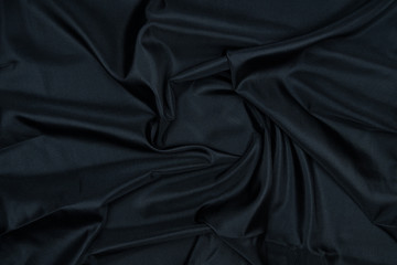Fototapeta premium Abstract black drapery cloth, Pattern and detail grooved of black fabric for background and abstract