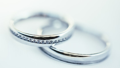 Close up of very expensive wedding rings for newlyweds, wedding concept, macro image