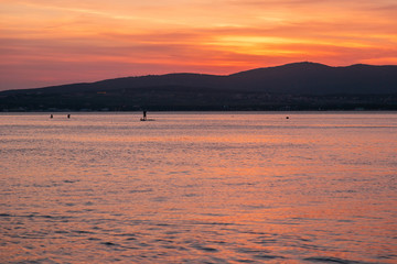SAP surfing at sunset in Gelendzhik, Krasnodar region.