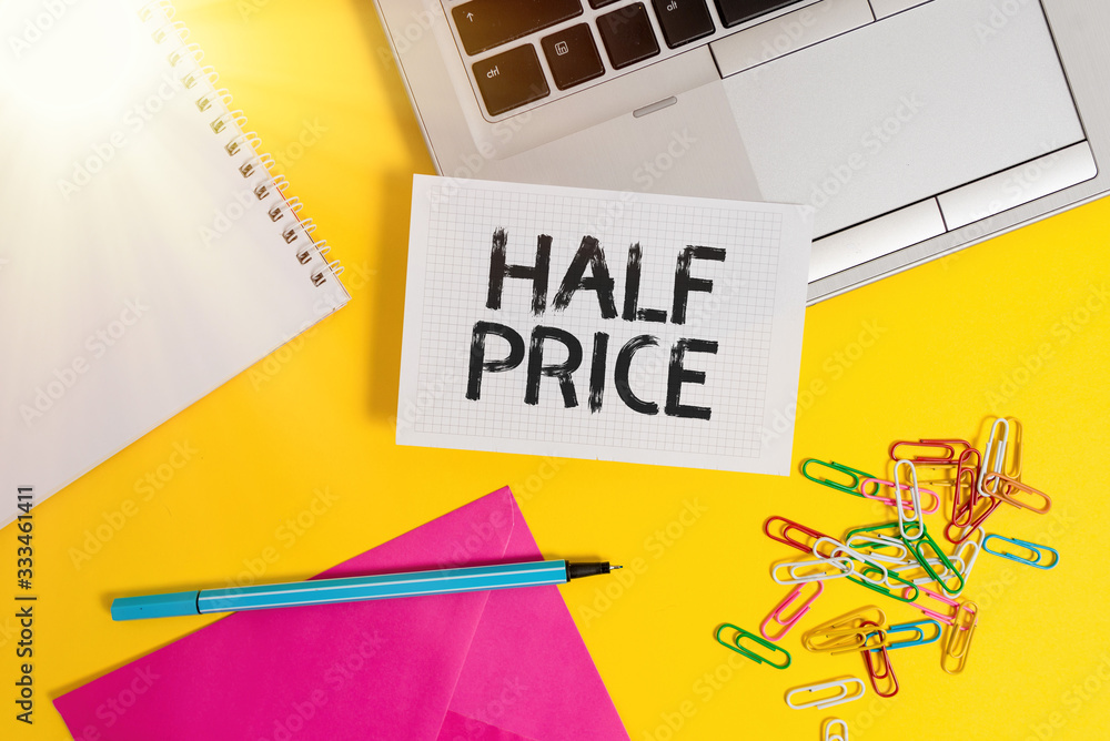 Poster writing note showing half price. business concept for half the usual price at which something is off
