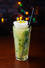bright delicious mojito cocktail with the decor.