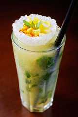 bright delicious mojito cocktail with the decor.