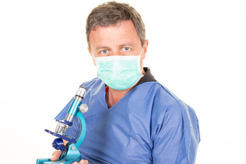Biology science doctor wearing protection face mask against covid-19 Virus bacteria cells Epidemic flu Coronavirus analyse microscope preventive gear