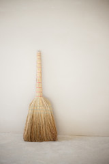 A broom near the wall