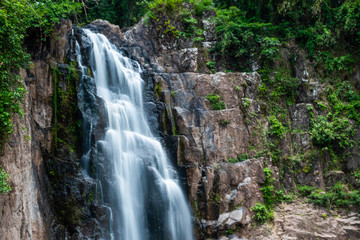 Fototapeta na wymiar Waterfall in deep forest of Thailand