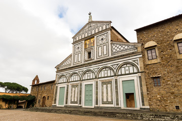 Fototapeta na wymiar Facade of Basilica of San Miniato al Monte (St. Minias on the Mountain) in Florence, Italy.