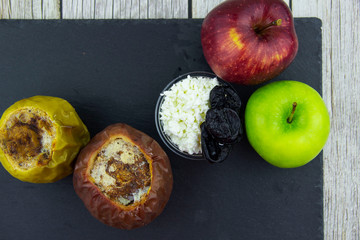 Cottage cheese with prunes and cinnamon baked in an Apple