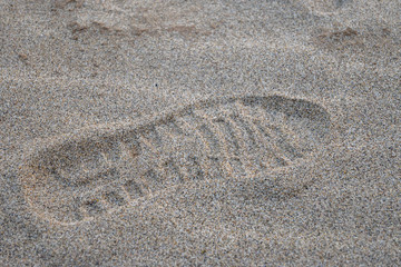Close-up of the footprints on the sand
