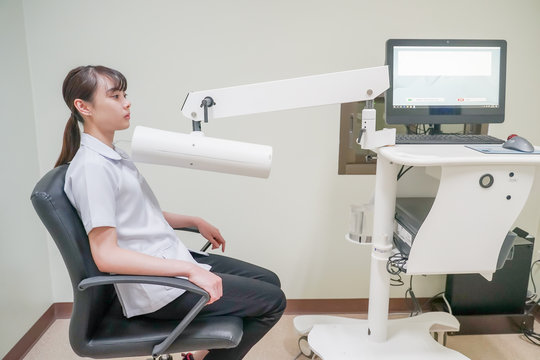 Patient In Sitting Position For Measure Iodine 131 Uptake Test At Thyroid Gland