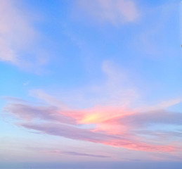 Gentle sky with fantastic pink-lilac clouds.