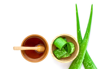 aloe vera leaf with honeyl isolated on white background. 