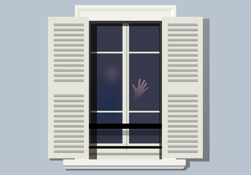 Concept de la solitude et du confinement suite à une épidémie, avec une personne qui pose sa main sur sa fenêtre en signe d’appel de détresse.