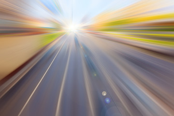 Fototapeta na wymiar Soft focus background. Cars ride on highway. City car traffic. Blur cars in motion.