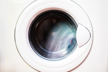 white door of a washing machine