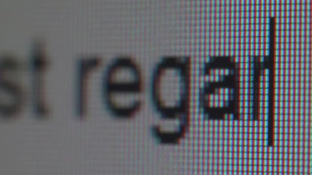 Macro view of text typing. Writing Best regards and hello.