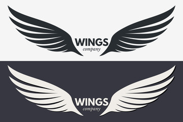Fototapeta premium Winged Emblem for Your Company. Wing Silhouette for Tattoo, Logo or Other Symbols