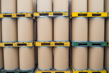 oil barrels or chemical drums stacked up, barrels made from fiber