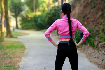 young woman running in the park