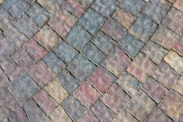 masonry wall paving stones as a background close up