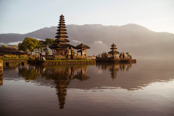 Sunrise over Temples on Lake in Bali Indonesia