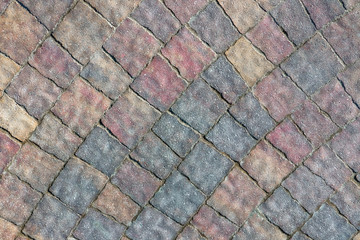 masonry wall paving stones as a background close up