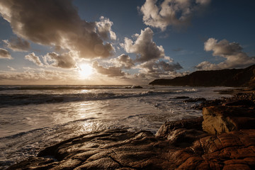 Sunset, clouds, beach and sea