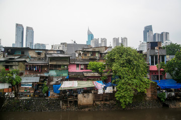 Modern Skyline of Jakarta over Slum