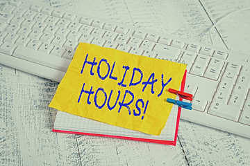 Conceptual hand writing showing Holiday Hours. Concept meaning employee receives twice their normal...