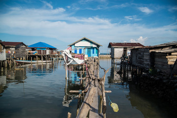 Stilt Village House over Ocean in Indonesia