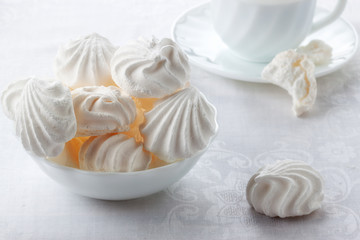 Tender, airy Bizet and a cup of fresh coffee with cream