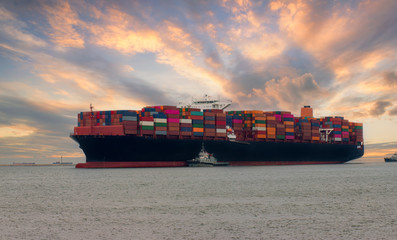 Perspective Container Cargo Ship Import Business Export Logistics and International Transport by Container Ship in the Sea at Sunset, Thailand
