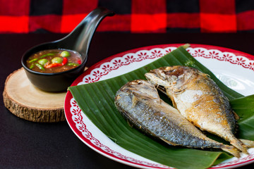 deep fried mackerel fish ready to eat is Thailand simplicity vintage style menu 