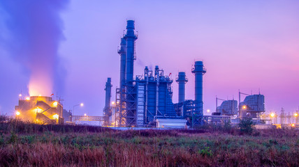 Fototapeta na wymiar Natural Gas Combined Cycle Power Plant with sunset and light orange