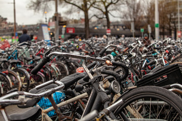 Fototapeta na wymiar many bikes on the streets of amsterdam
