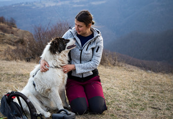 woman with her dog outdoors