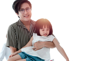 Father playing with daughter, daddy carrying his little cute girl, happy family spending fun time together at home