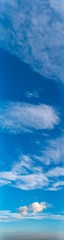 Fantastic clouds against blue sky, panorama