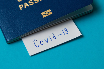 Coronavirus and travel concept. Note the coronavirus COVID-19 and passport. A new outbreak of the corona virus.